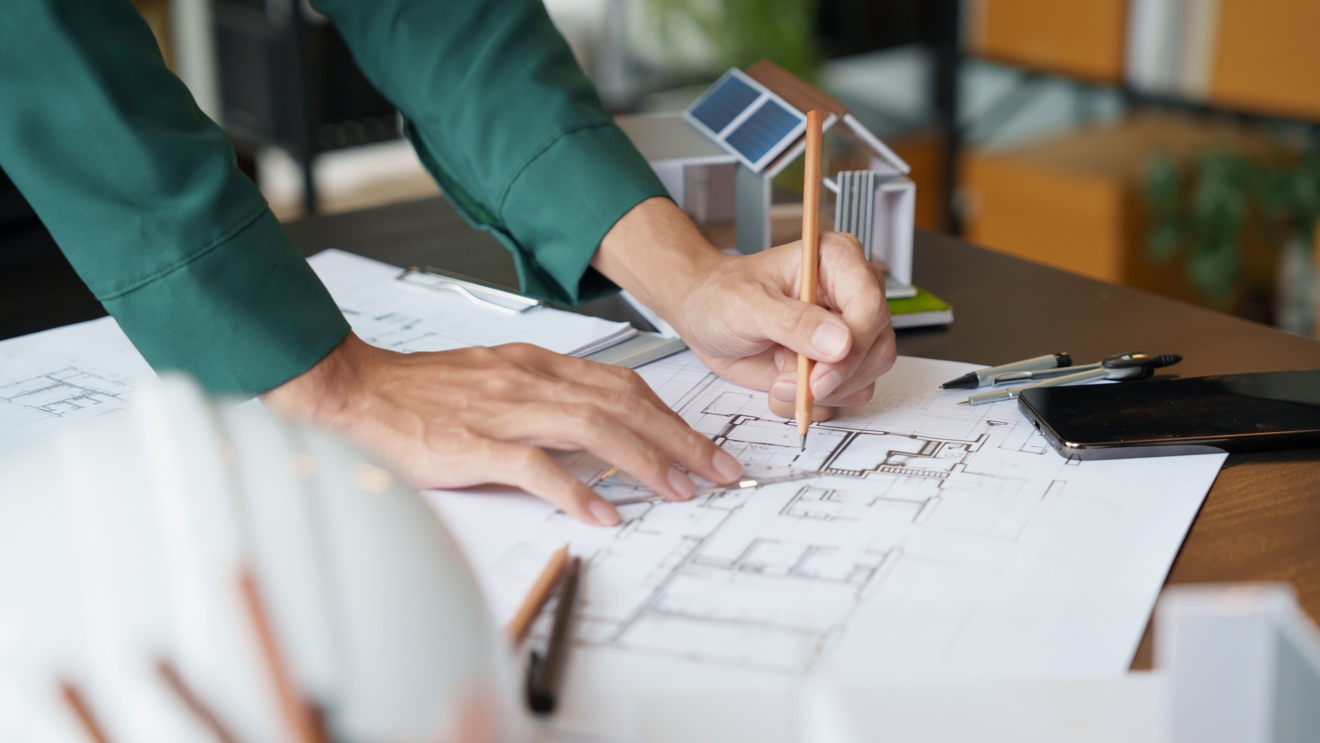 Architecture Man drawing on architectural Creative project business architecture building constructionÂ Industrial engineering Achievement Planning Design on eco blueprint